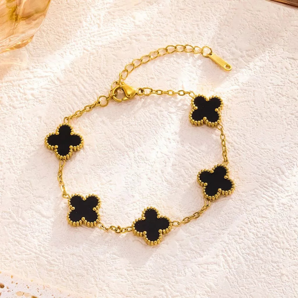 Pulseira de trevo dourado dupla face em aço titânio banhado 18K