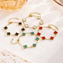 Pulseira de trevo dourado dupla face em aço titânio banhado 18K