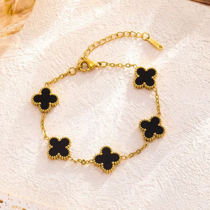 Pulseira de trevo dourado dupla face em aço titânio banhado 18K