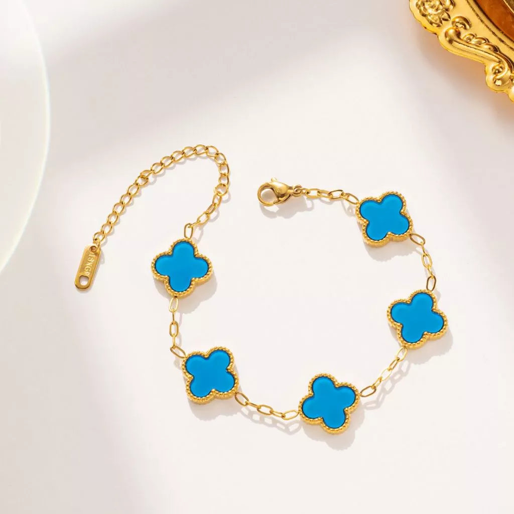 Pulseira de trevo dourado dupla face em aço titânio banhado 18K