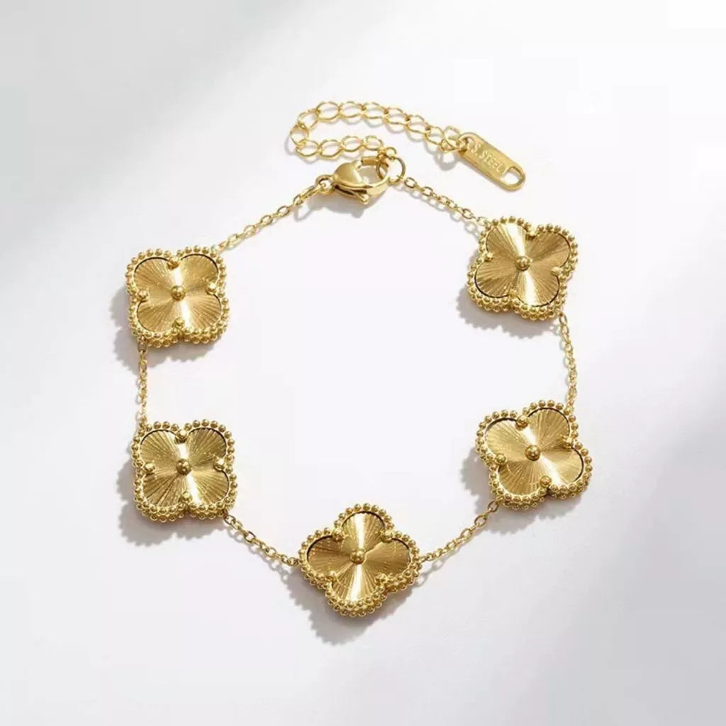 Pulseira de trevo dourado dupla face em aço titânio banhado 18K